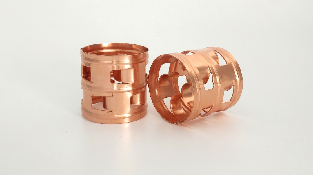 Microscopic comparison of Copper and Steel Pall Ring surfaces