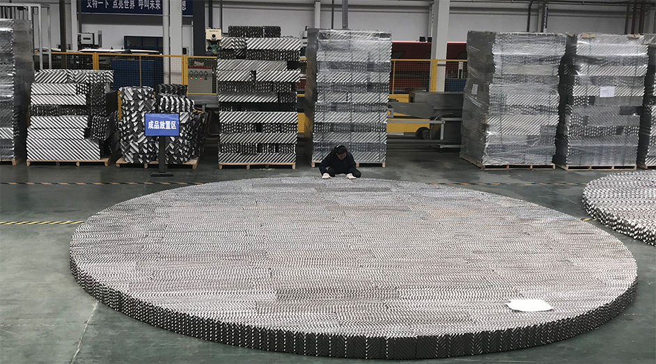 Fouled unperforated packing versus clean perforated plate packing after dirty service