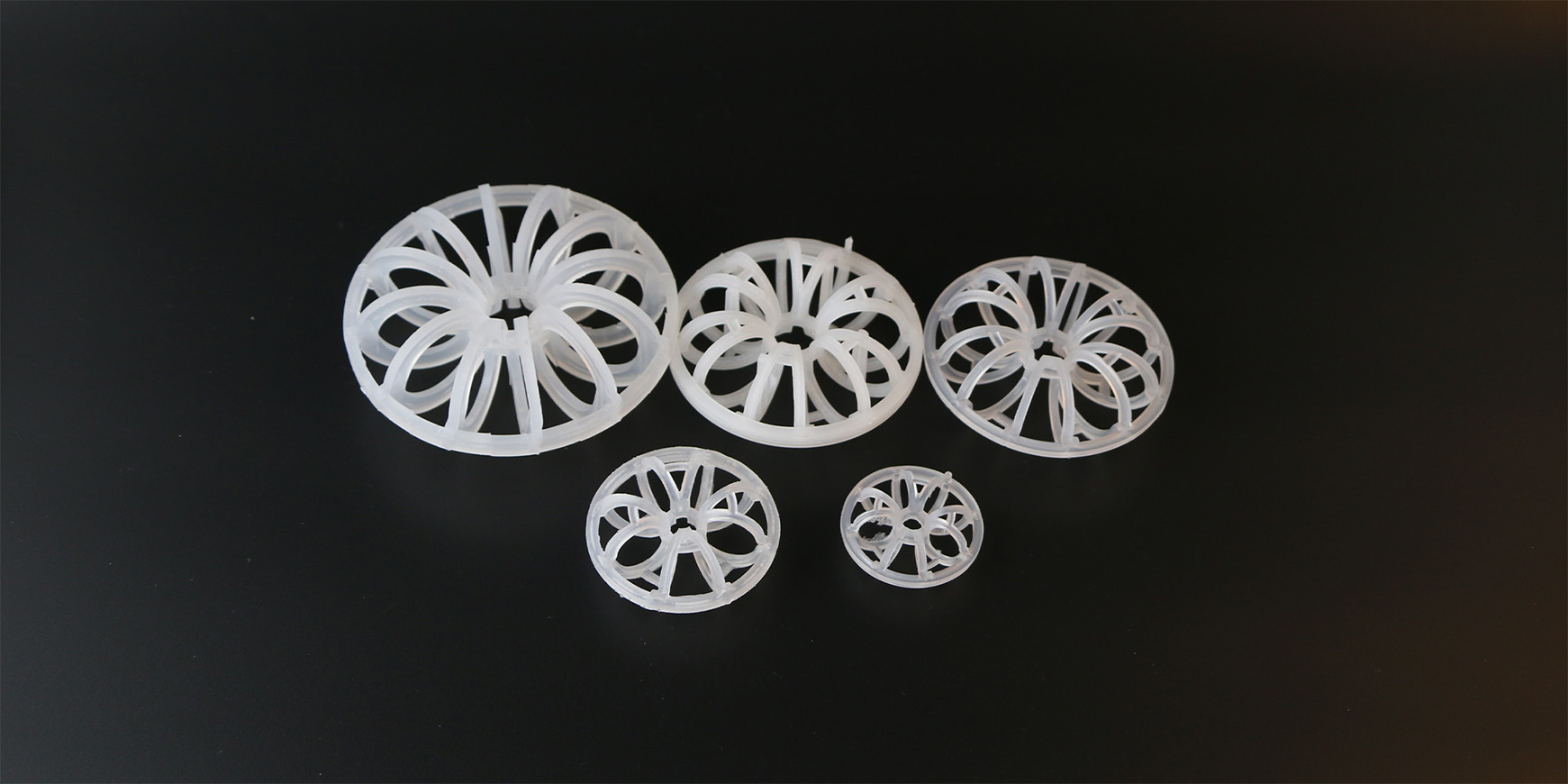 Close-up of PP Teller Rosette Ring showing radial small-ring arrangement and open framework